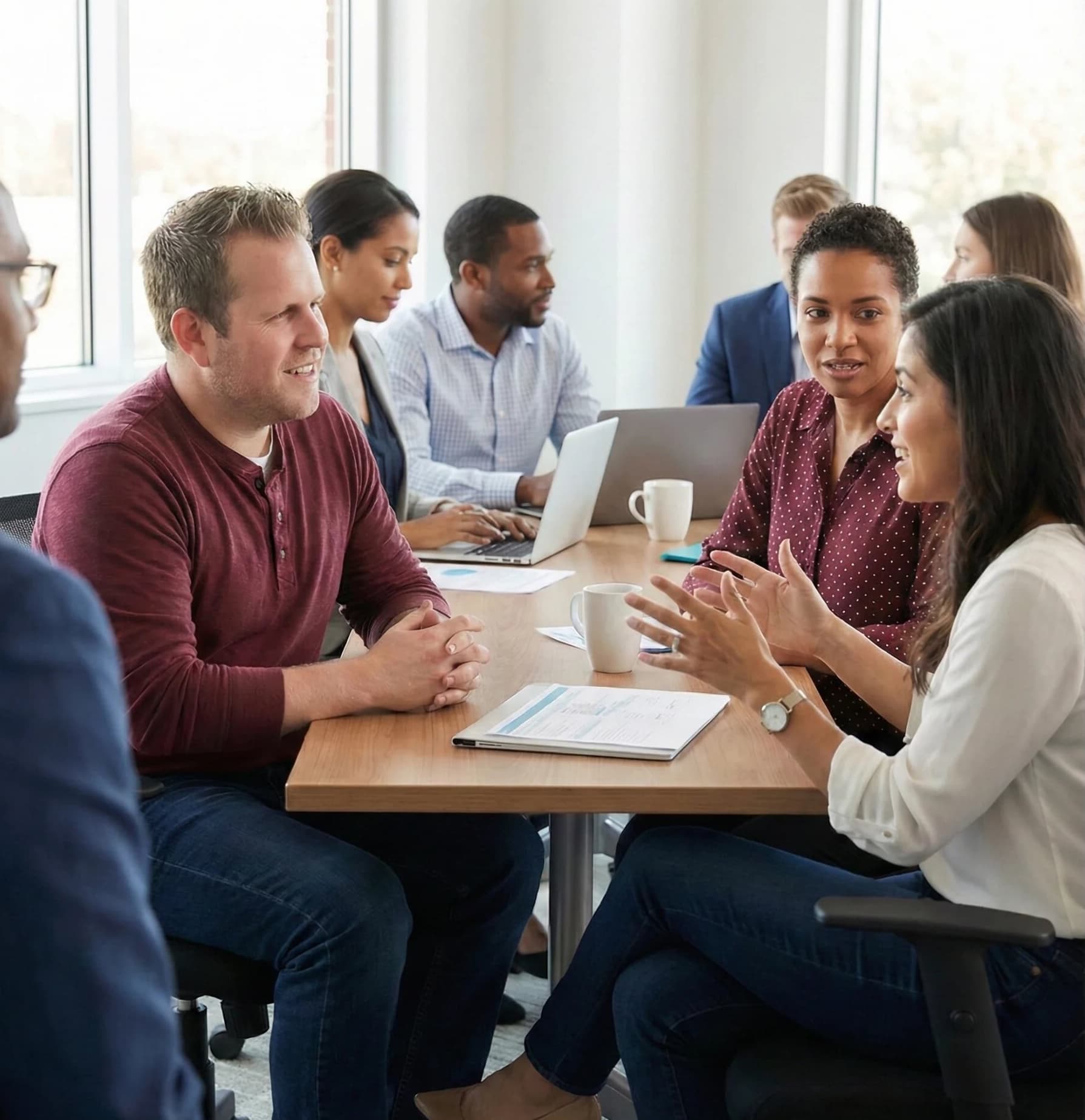 Colin in team meeting transferring knowledge
